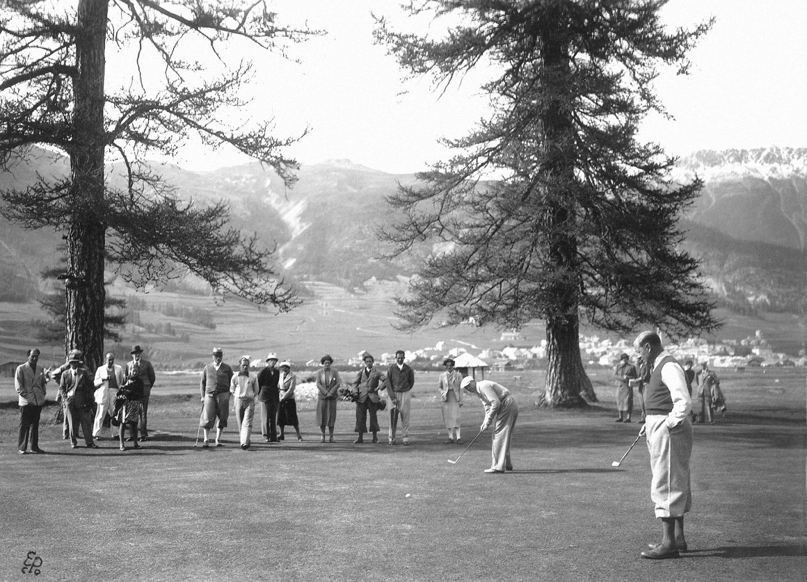 Playing golf at the Engadine Golf Club in Switzerland